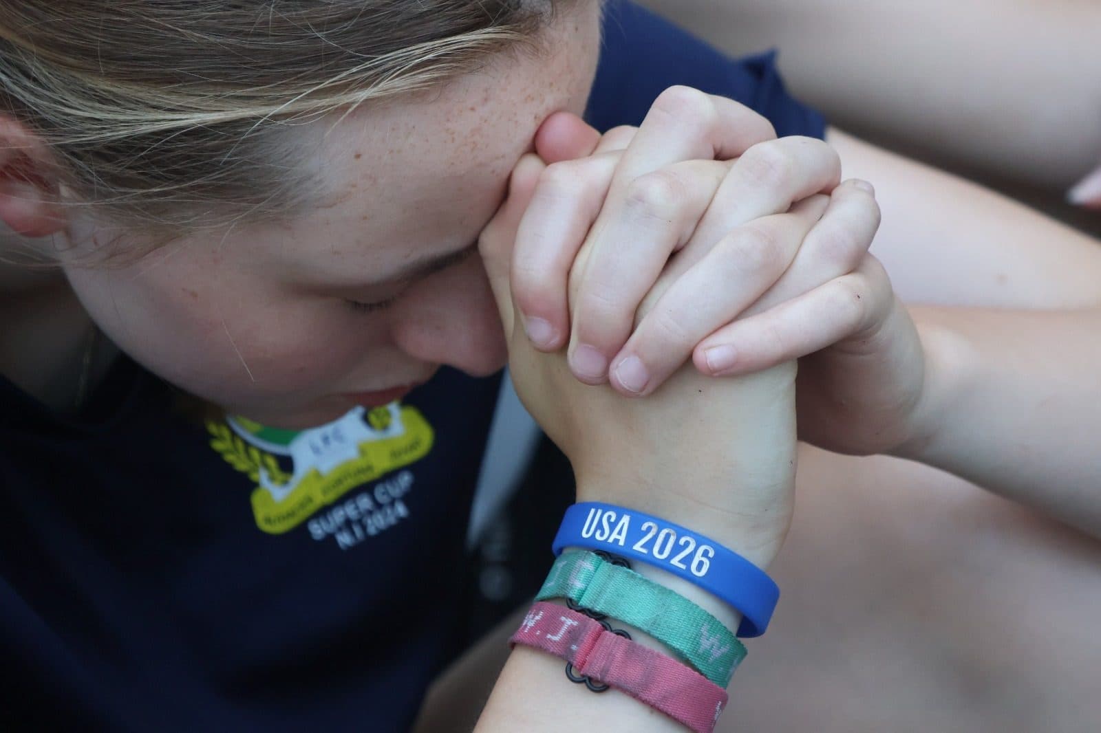 A team member praying before setting off for the day